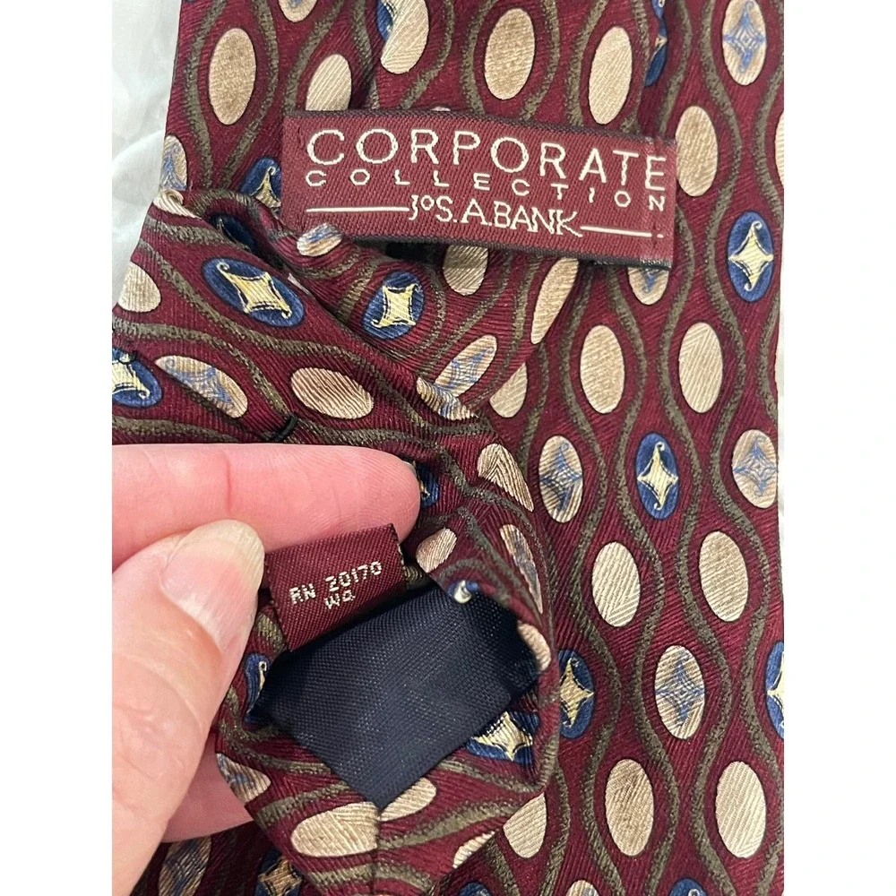 00244-JosA Bank Corporate Collection Silk Tie Burgundy Tan Blue Geometric w/ Box